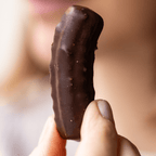 Krumiretti biscuits covered in dark chocolate in a 180g tin 