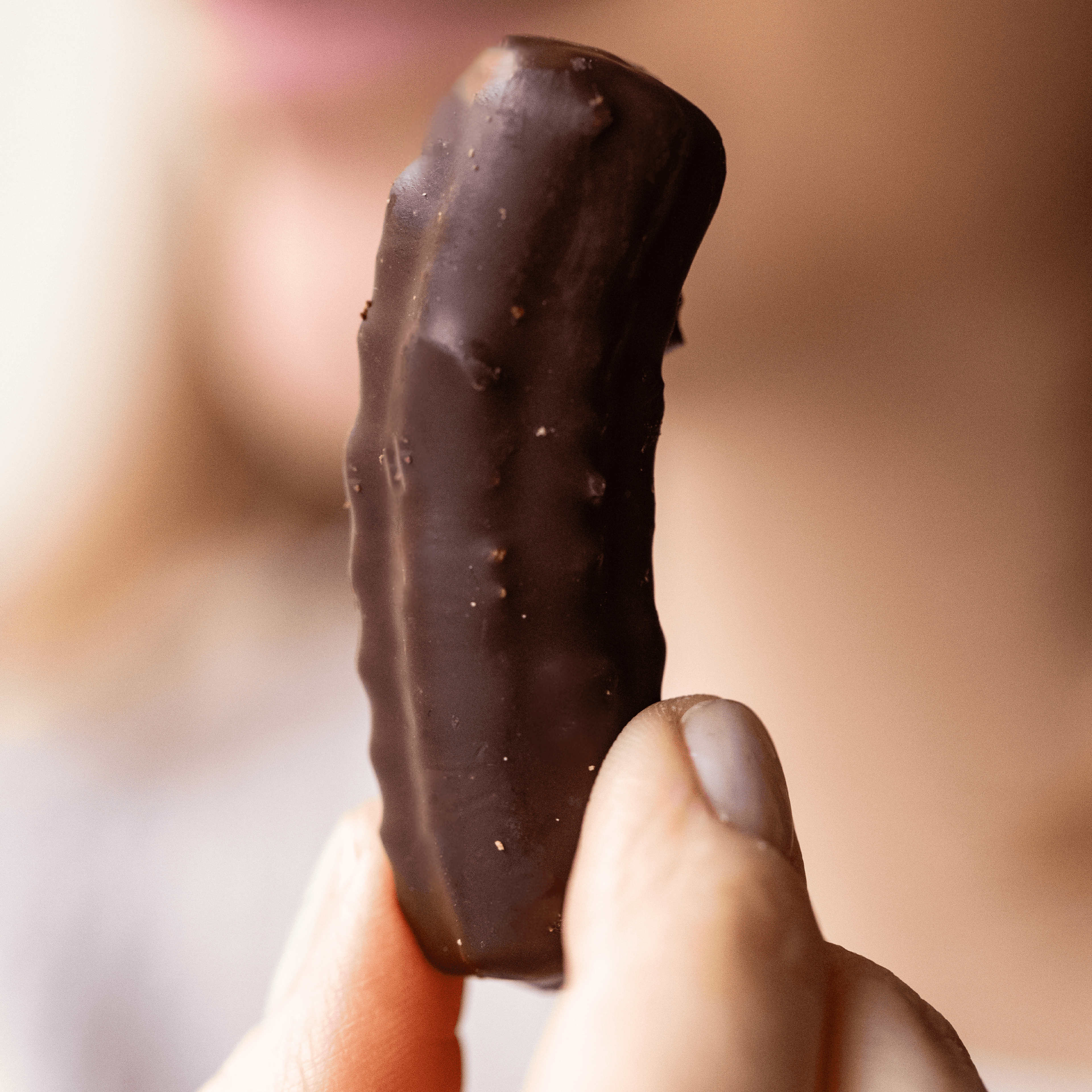 Krumiretti biscuits covered in dark chocolate in a 180g tin 